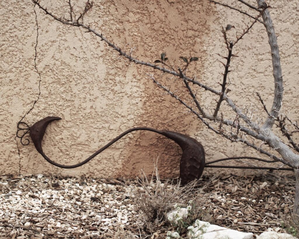 héron en fer dans mon jardin